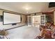 Cozy media room featuring a large screen and comfortable seating at 2452 Stone Manor Ne Dr, Buford, GA 30519