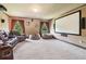 Comfortable home theater featuring plush seating and a large projection screen at 2452 Stone Manor Ne Dr, Buford, GA 30519