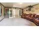 Luxury home theater room with a movie screen and a leather reclining sofa at 2452 Stone Manor Ne Dr, Buford, GA 30519