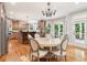Kitchen with wood cabinets, stainless steel appliances, and a breakfast nook at 2452 Stone Manor Ne Dr, Buford, GA 30519