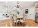 Bright and open eat-in kitchen/dining area with hardwood floors and stainless appliances at 2452 Stone Manor Ne Dr, Buford, GA 30519