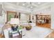 Open concept living room and kitchen with hardwood floors and natural light at 2452 Stone Manor Ne Dr, Buford, GA 30519