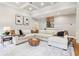 Bright and airy living room with a comfortable sectional sofa, stylish decor, and plenty of natural light at 2452 Stone Manor Ne Dr, Buford, GA 30519