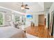 Open and airy main bedroom with hardwood floors, lots of natural light, and a sitting area at 2452 Stone Manor Ne Dr, Buford, GA 30519