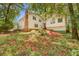 Exterior view of the backyard showcasing the greenery and the house at 3196 Windfield Cir, Tucker, GA 30084