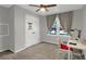 Cozy bedroom with a neutral color palette, carpet flooring and window with light-blocking curtains at 3196 Windfield Cir, Tucker, GA 30084