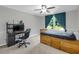 Bedroom with a ceiling fan, large window with curtains, and a desk with computer at 3196 Windfield Cir, Tucker, GA 30084