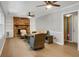 Comfortable living room features hardwood floors, brick fireplace, built-in shelves and ceiling fans at 3196 Windfield Cir, Tucker, GA 30084