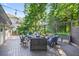 Outdoor deck with stylish seating amidst serene, natural surroundings, perfect for relaxing and entertaining with Gathering and friends at 6077 Lake Lanier Heights Rd, Buford, GA 30518