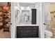 Updated bathroom with modern vanity, fixtures, and tiled shower at 6077 Lake Lanier Heights Rd, Buford, GA 30518