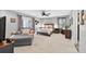 Spacious main bedroom with sitting area and natural light at 6077 Lake Lanier Heights Rd, Buford, GA 30518