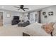 Generous main bedroom features sitting area and ceiling fan at 6077 Lake Lanier Heights Rd, Buford, GA 30518