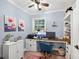 Comfortable home office with custom shelving and built in desk at 6077 Lake Lanier Heights Rd, Buford, GA 30518
