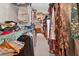 Spacious walk-in closet with ample hanging space and shelving for organized storage at 6077 Lake Lanier Heights Rd, Buford, GA 30518