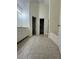 Bathroom featuring a tub, walk-in shower, and double vanity at 709 Stonehenge Pl, Jonesboro, GA 30236