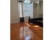 Bedroom featuring hardwood floors, a closet, and natural light at 709 Stonehenge Pl, Jonesboro, GA 30236