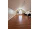 Spacious upstairs bonus room with hardwood floors and natural light at 709 Stonehenge Pl, Jonesboro, GA 30236
