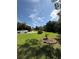 Expansive front yard with a well-manicured lawn, perfect for curb appeal at 709 Stonehenge Pl, Jonesboro, GA 30236