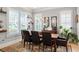 Elegant dining room featuring windows with shutters and a stylish chandelier at 127 Oak Ln, Decatur, GA 30030