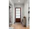 Welcoming entryway featuring a wooden front door with glass panes and white trim at 127 Oak Ln, Decatur, GA 30030