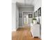 An open hallway with wood flooring and neutral-colored walls, featuring picture frame decoration at 127 Oak Ln, Decatur, GA 30030