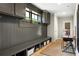 Functional mudroom with custom cabinetry, bench seating, and storage hooks at 127 Oak Ln, Decatur, GA 30030