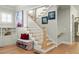 Traditional staircase with hardwood floors, white risers and gray walls at 127 Oak Ln, Decatur, GA 30030