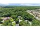Aerial view of property with mature trees at 340 Helens Manor Dr, Lawrenceville, GA 30045