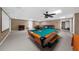 Spacious finished basement with a pool table, seating area, and ample space for entertaining at 340 Helens Manor Dr, Lawrenceville, GA 30045