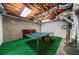 Unfinished basement area with ping pong table at 340 Helens Manor Dr, Lawrenceville, GA 30045