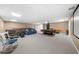 Large finished basement with pool table, multiple seating areas, and ample space for recreation and relaxation at 340 Helens Manor Dr, Lawrenceville, GA 30045