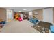 Spacious finished basement with play area, seating, and ample room for recreation at 340 Helens Manor Dr, Lawrenceville, GA 30045