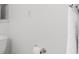 White bathroom with a towel and toilet paper at 340 Helens Manor Dr, Lawrenceville, GA 30045