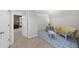 Bonus room featuring a seating area, small table, and a door to another room at 340 Helens Manor Dr, Lawrenceville, GA 30045