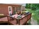 Back deck with outdoor seating and grill at 340 Helens Manor Dr, Lawrenceville, GA 30045