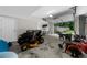 Spacious garage featuring an open door, lawn mower, and yard tools for convenient outdoor maintenance at 340 Helens Manor Dr, Lawrenceville, GA 30045