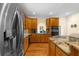 Well-equipped kitchen with stainless steel appliances, granite countertops and custom cabinetry at 340 Helens Manor Dr, Lawrenceville, GA 30045