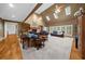 Large living room with vaulted ceilings, skylights, fireplace and hardwood flooring at 340 Helens Manor Dr, Lawrenceville, GA 30045