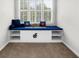 Window seat with storage and blue cushions at 340 Helens Manor Dr, Lawrenceville, GA 30045