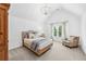 Bright bedroom featuring neutral tones, vaulted ceiling, and natural light at 7025 Windsor Hill Psge, Suwanee, GA 30024