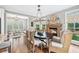 Charming dining area with stone fireplace provides a cozy and elegant atmosphere at 7025 Windsor Hill Psge, Suwanee, GA 30024