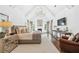 Spacious main bedroom features a tray ceiling, fireplace, and elegant decor at 7025 Windsor Hill Psge, Suwanee, GA 30024