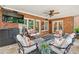 Charming outdoor patio with brick accents, ample seating, and cozy ambiance at 7025 Windsor Hill Psge, Suwanee, GA 30024