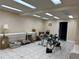 Spacious bonus room offering tile floors, neutral walls and lighting, and ample space for fitness equipment at 810 Doe Hill Ln, Roswell, GA 30075