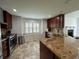 Spacious kitchen with granite countertops and stainless steel appliances at 810 Doe Hill Ln, Roswell, GA 30075