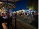 Outdoor street fair with many people enjoying an evening with friends at 810 Doe Hill Ln, Roswell, GA 30075