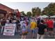 Lively street fair with food, drinks, and many people enjoying the outdoor event at 810 Doe Hill Ln, Roswell, GA 30075