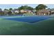 Community tennis courts with players enjoying a match on well-maintained courts at 810 Doe Hill Ln, Roswell, GA 30075