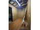 Unfinished basement with wooden floor and exposed wooden beams at 1165 Vineyard Ct, Stone Mountain, GA 30083