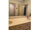 Bathroom with double sinks and view to the toilet and shower room at 1165 Vineyard Ct, Stone Mountain, GA 30083